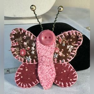 Rustic homemade butterfly pin